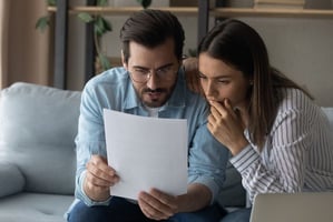 Couple looking at home loan paperwork